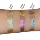 Rosy liquid shimmer by Sérénité Soin applied on skin for soft pink glow on eyelids, cheeks and lips with radiant finish.